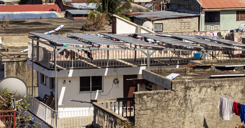 Four Starlink dishes from just three rooftops next to each other in downtown Cap-Haïtien in July 2025. Photo by Onz Chéry/ The Haitian Times