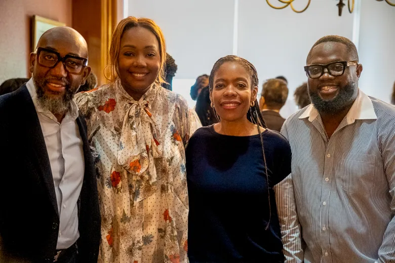 From left, restauranteur Fred Raphael; Maritiza Bourdoir Guerrier, CEO of Boudoir House; New York City Council Member Rita Joseph; and an attendee gather during the leadership breakfast at Brooklyn College in Brooklyn on July 30, 2026. Fredner Cayemitte / The Haitian Times