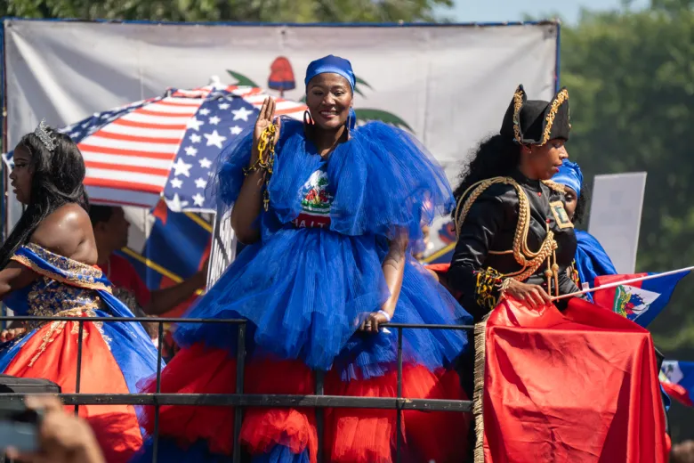Masqueraders on a decorative float during the West Indian Day Parade in Brooklyn, N.Y., Sept. 7, 2026. Photo by Fredner Cayemitte for The Haitian Times.
