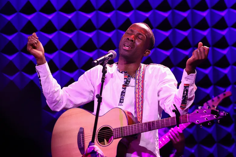 Haitian singer-songwriter BéLo on stage with musicians Ragganga. Dony Felix, on bass, Harvek Nakundi on drums imbued the classic tunes with added thump, Dony Felix, Robertson played ferocious guitar solos while Okai was on tambour and percussion.